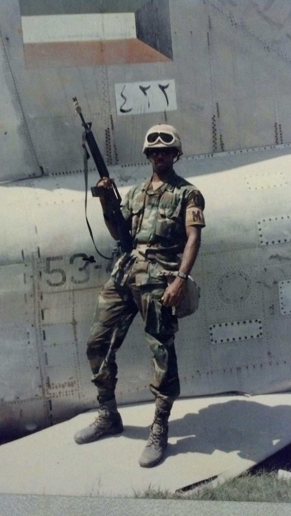 Kuwait — standing on captured Iraqi aircraft